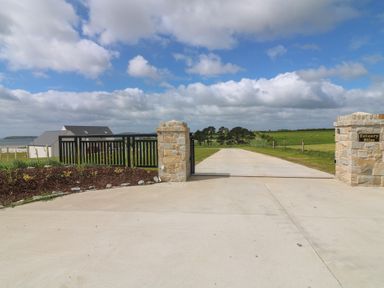A gated entrance leading to Estuary Bliss in Duncannon, County Wexford