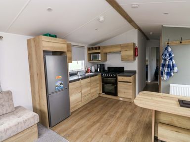 A kitchen with appliances and cabinets at Valley 36 in Kingsbridge