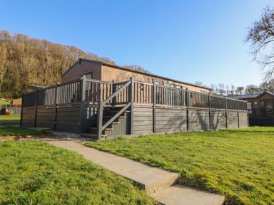 A building with decking and steps in an outdoor area at The Ridgeway in New Quay