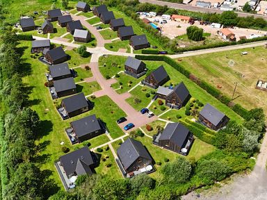 Aerial view of holiday cabins and parking at Pumpkin Lodge near Brigg