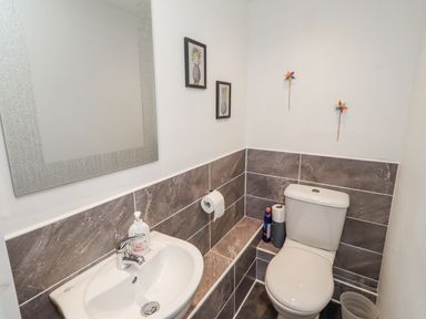 A bathroom with a sink and toilet at 55 Meldon terrace Newbiggin-by-the-Sea