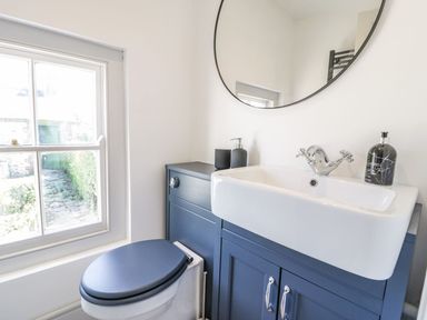 A bathroom with a sink and toilet at Ty Mawr Farm in Llanfairpwllgwyngyll