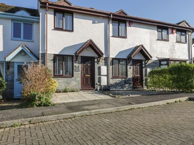 A house with doors and windows on a pathway at Seahorses Padstow