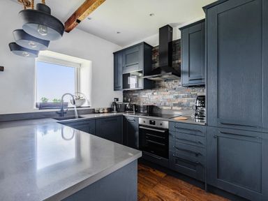 A kitchen with counter space and appliances at Cape View near St Just