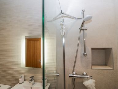 A bathroom with shower and sink at Ambwray in Ambleside