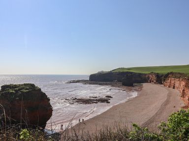 A coastal view with cliffs and beach at Bordeaux Ladram Bay Otterton