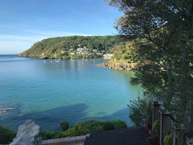 A view of water with boats and trees at Beachside 2-Bed - Sleeps 4, Parking & Pet Friendly, Salcombe