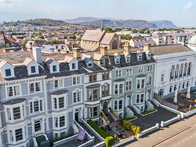 A view of houses and a walkway at Sea View, East Parade Llandudno