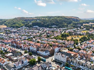 An aerial view of a residential area with houses and roads at Sea View, East Parade, Llandudno