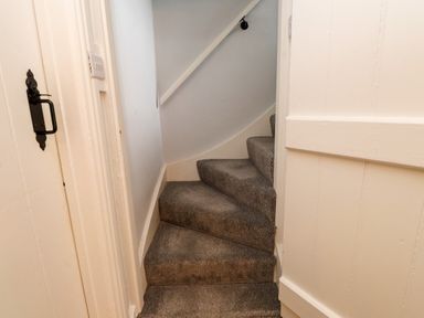 A staircase leading to another level at 3 Tre Felin Llandygai near Bangor