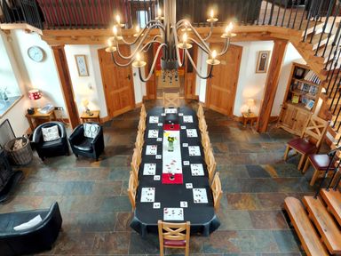 A dining room with a large table and chairs at Kaber Chapel in Kaber near Kirby Stephen