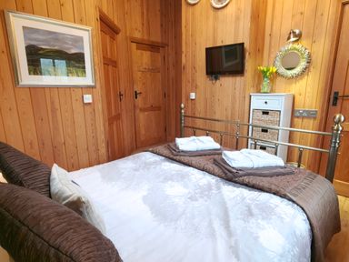A bedroom with a bed and furnishings at Kaber Chapel in Kaber near Kirby Stephen