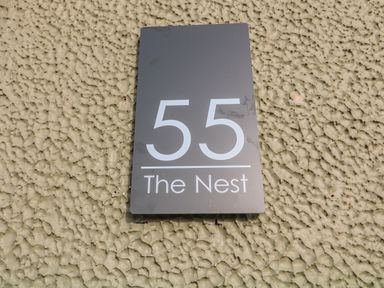 A property sign displaying 55 The Nest in Grantham