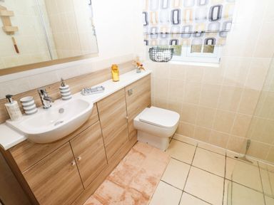 A bathroom with sink and toilet at Stone Lodge near Haltwhistle
