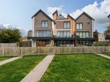 A house with balconies and a garden at 2 Glan Yr Aber in Colwyn Bay