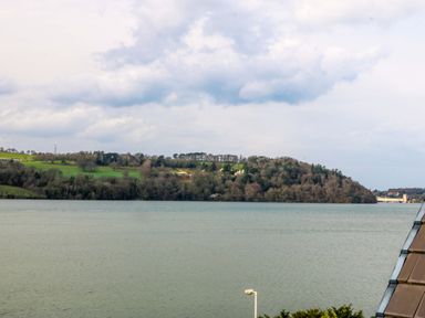 A view of hills and water at 2 Glan Yr Aber in Colwyn Bay