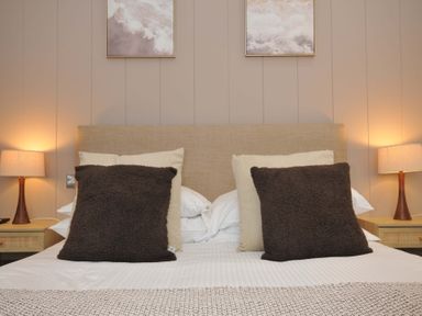 A bedroom with a bed and pillows at 4 Southern Place in Dobwalls