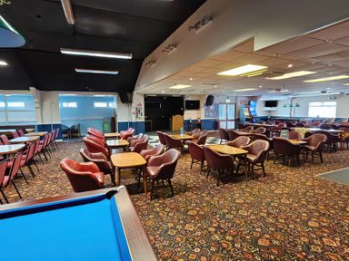 A bar with seating and a pool table at Salt Air 130 @ Park Ave Holiday Village in Leysdown-On-Sea, Kent
