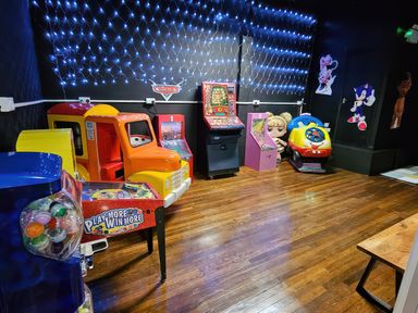 A game room with arcade machines and a toy truck at Salt Air 130 @ Park Ave Holiday Village, Leysdown-On-Sea, Kent