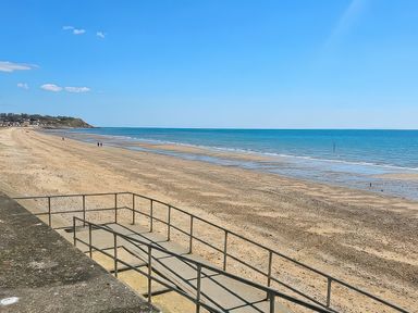 A beach with sand and a walkway at Salt Air 130 @ Park Ave Holiday Village, Leysdown-On-Sea, Kent