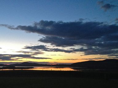 A scenic view of the sunset over water at Welcome to the wild Atlantic way Mulroy Bay