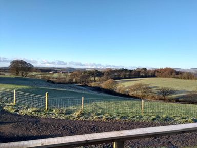 A scenic landscape view with fields and trees at Cleeves Cabins 2, Arran Luxury Lodge with hot tub, St. John's Town Of Dalry