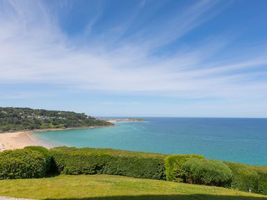 A beach with sand and sea view at Anchors Rest in St. Ives