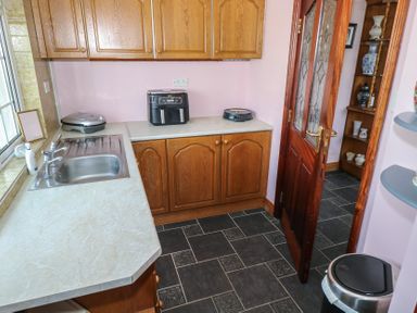 A kitchen with countertops, sink, and appliances at Marie's Country Home in Ardee, County Louth