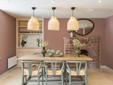 A dining room with a table and chairs at Hidden 2-Bay House Hot Tub in St Ives