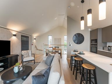 A living room with a sofa and coffee table at tbc in St. Ives