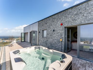An outdoor area with a hot tub at tbc in St. Ives