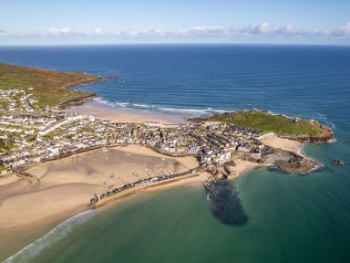 An aerial view of a coastal town with beach and sea at Hidden 18- St Ives Bay Suite Hot Tub, St Ives