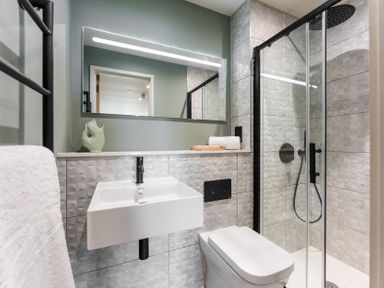 A bathroom with a sink and a shower at tbc in St. Ives