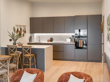 A kitchen with cabinets and appliances at tbc in St. Ives