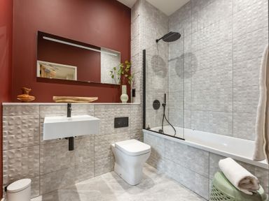 A bathroom with a bathtub and a sink at tbc in St. Ives