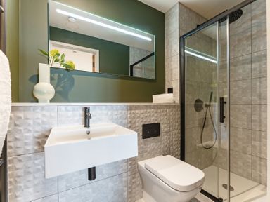 A bathroom with a sink and shower at tbc in St. Ives
