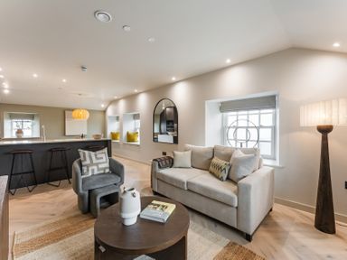 A living room with a couch and coffee table at tbc in St. Ives