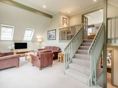 A living room with a sofa and coffee table at The Derwent Spa (Pet) in Slaley