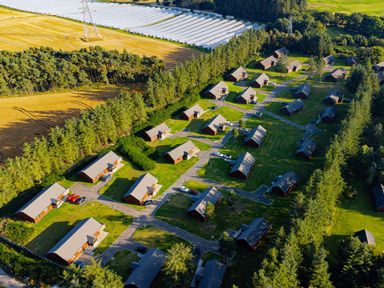 An aerial view of cabins and farmland at Sidlaw in Fowlis near Dundee