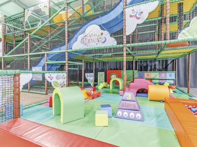 A play area with slides and soft play equipment at Sidlaw in Fowlis near Dundee
