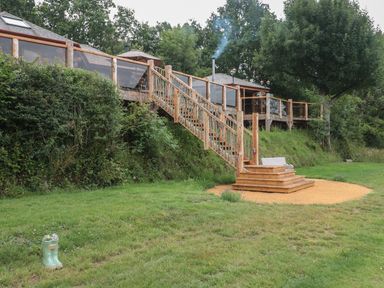 An outdoor area with stairs leading to a house at Copper Suite in Chulmleigh