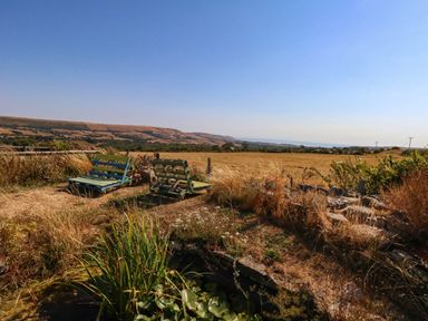 A view of a field with chairs at Dunvant in Swanage