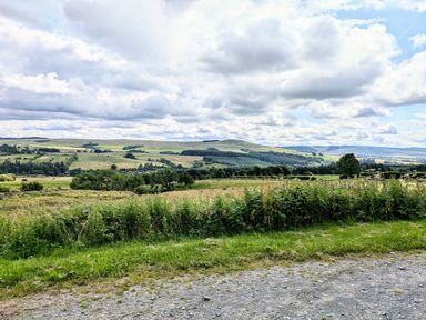 A landscape with hills and trees at Pet Friendly - Lodge at Riverview Holiday Park, Mangerton near Newcastleton
