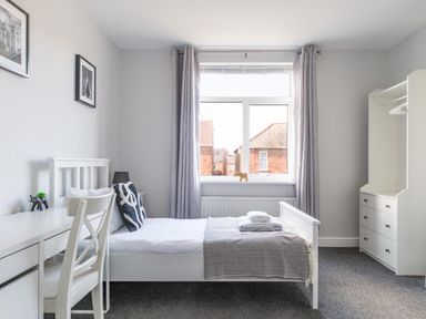A bedroom with a bed and a desk at Lily Apartment - Sleeps 3 - Pet friendly - Parking in Bedlington
