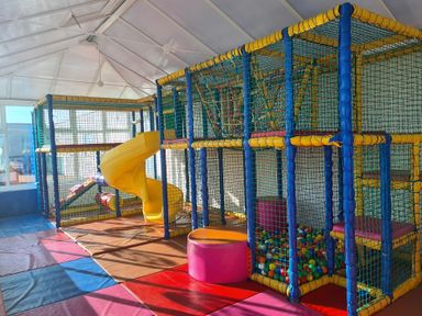 A play area with climbing structure and slide at 3 Bed, Sleeps 6, Parking
