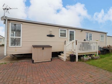 A mobile home with porch and outdoor furniture at Winchester - 478 Abergele