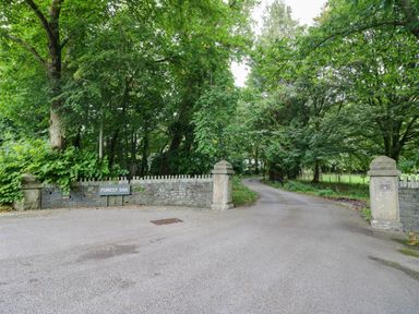 A gateway entrance with a sign labeled 'FOREST SIDE' at Flat 4 Grasmere Lodge Ambleside