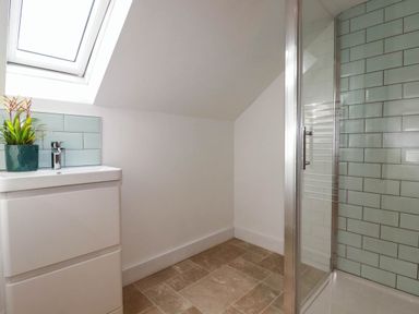 A bathroom with a sink and shower at The Granary in Launceston