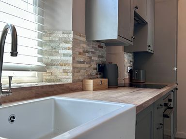 A kitchen with a sink and countertop at Downton I in Alnwick