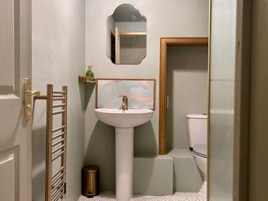A bathroom with a sink and toilet at Downton I in Alnwick